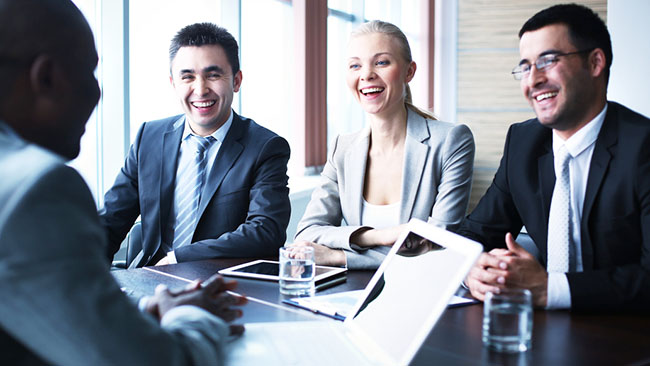 Image of business people interacting at meeting